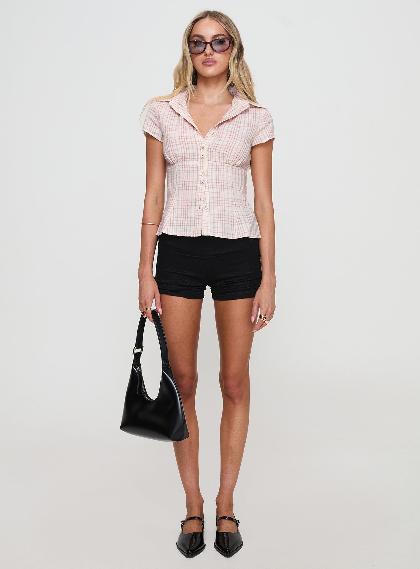 front view of model wearing Princess Polly Cottesloe Blouse Top Pink Check Short Sleeves V-Neck